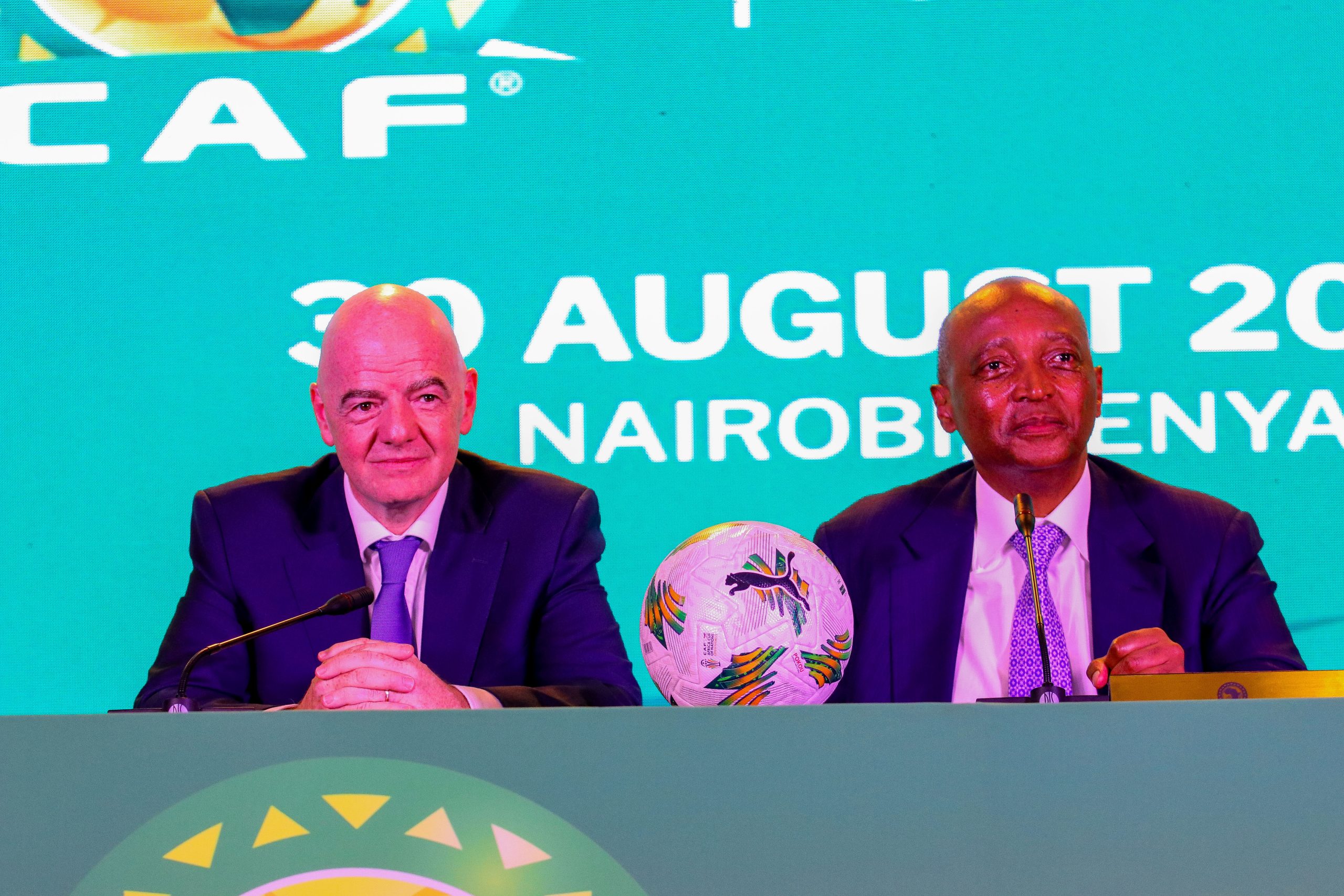 NAIROBI, KENYA - AUGUST 30: FIFA President Gianni Infantino (L) and Confederation of African Football (CAF) President Dr. Patrice Motsepe (R) address the media at the Villa Rosa Kempinski Hotel on August 30, 2025, in Nairobi, Kenya. The press conference followed a CAF Executive Committee meeting and was held ahead of the 2024 Africa Nations Championship (CHAN) final at Kasarani National Stadium. (Photo by Samwel Ogor/Tukio Images)
